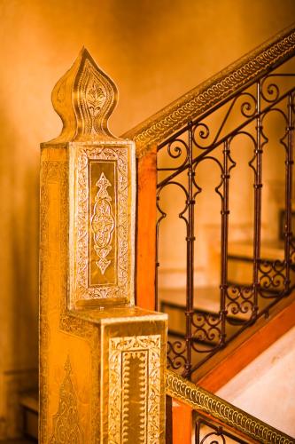 Un ou plusieurs lits dans un hébergement de l'établissement Riad & Spa Laurence Olivier