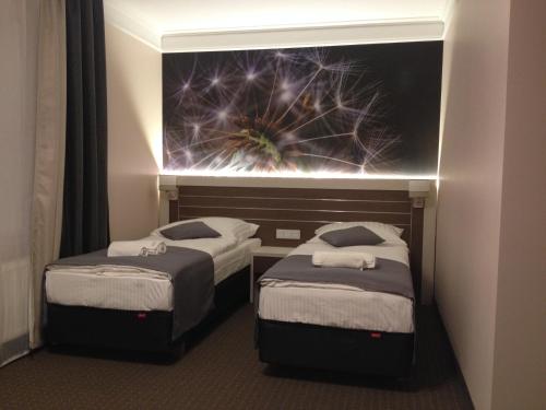Una cama o camas en una habitación de Motelis Bu-Bu