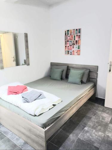 a large bed in a room with at Seawaves in Ierissos