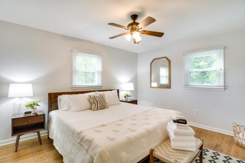a bedroom with a bed and a ceiling fan at Memes Cottage Near Nelson 151 in Afton