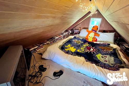 a bedroom with a bed in a tent at The Shack at Long Beach - A Psychedelic Getaway in Long Beach