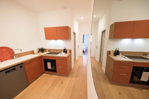 Les Suites du Parc - Appartement lumineux de 2 chambres avec une vue imprenable sur le parc Simone Veil à 2 minutes des halles