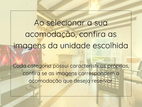 a glass window in a room with the words no astronomer a subahoococo at Villa Belle Chalés in Campos do Jordão