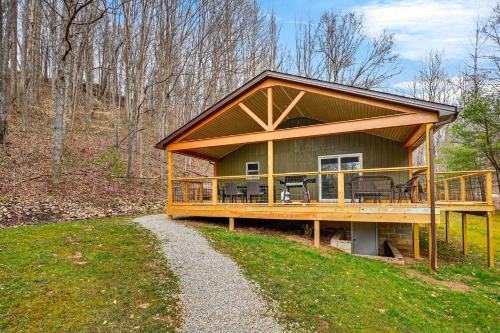 a large wooden house with a large deck at Lane's End in Laurelville