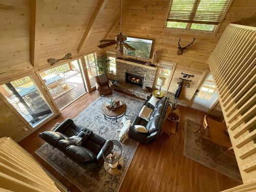 an overhead view of a living room with a fireplace at Bella Vista! Long range MTN views, Hot Tub, Close to town and Lake in Blue Ridge