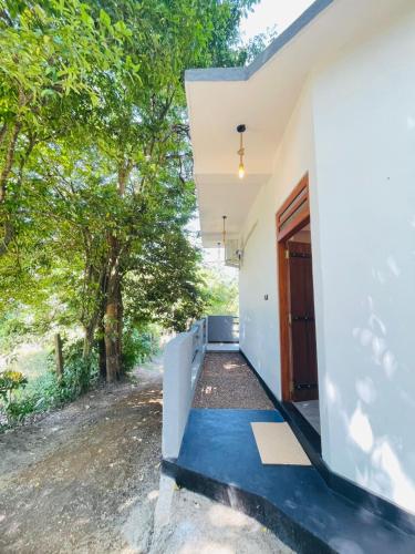 an external view of the entrance to a house at Mond Villa Weligama - Private Surf & Nature Stay near Beach in Weligama