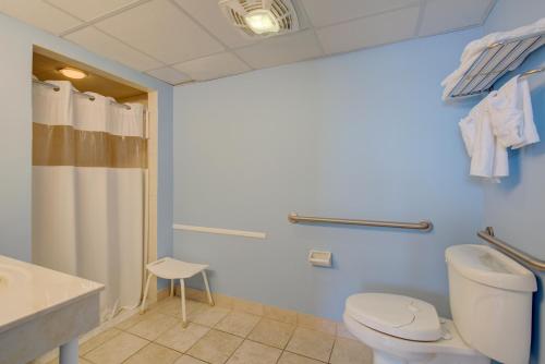 a bathroom with a toilet and a sink at Ocean 7 in Ocean City