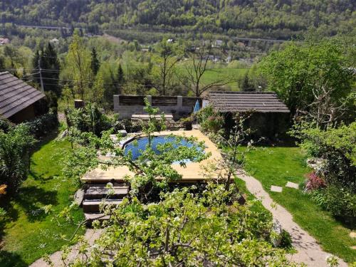 an aerial view of a garden with a swimming pool at Apartma Zeus in Jesenice