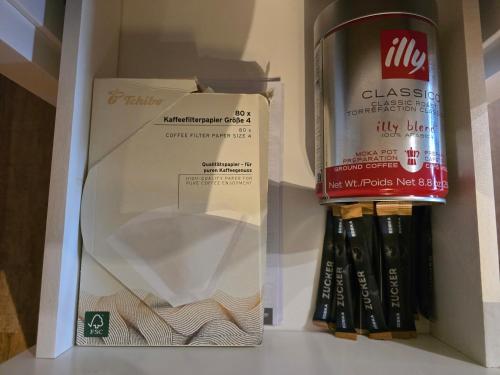 a pack of cigarettes and a can of milk in a refrigerator at Ferienwohnung Ulbricht mit aktivCARD in Sankt Englmar