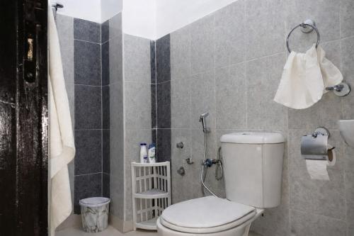 a bathroom with a toilet and a shower at Spacious 2BR Apartment with Moroccan Salon near Aquaparc Tamaris Casablanca in Casablanca