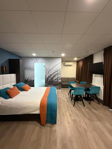 Postel nebo postele na pokoji v ubytování Rivers Hotel