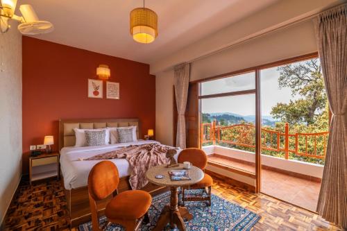a bedroom with a bed and a large window at PACK Shimla in Shimla
