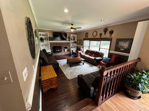 an aerial view of a living room with a fireplace at Large Home with Private Pool, Gym, Sauna, 7 Bedrooms, Sleeps 21 in Severn
