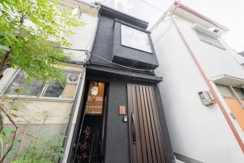 明家 Akariya 4-minute walk from the nearest station, direct line to downtown and USJ, 2 bedrooms, maximum 4 guests