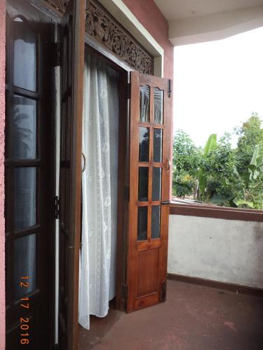 Балкон или терраса в Raja174 Homestay