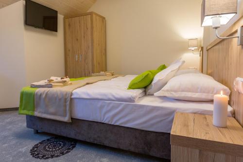 Grand Tatry - miejsce na wyjątkowy pobyt dla Ciebie i Twojej rodziny! - sauna i jacuzzi wliczone w cenę pobytu - 10 minut pieszo od Term Baniaにあるベッド