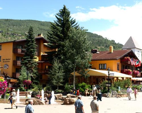 a group of people standing in front of a building at Hotel Gasthof Gramshammer in Vail