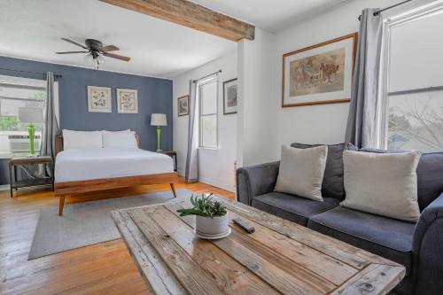 a living room with a bed and a coffee table at 2BR Apt 8 min to Integris Monthly 15 Off #N3 in Oklahoma City