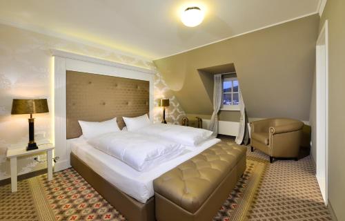 Ένα ή περισσότερα κρεβάτια σε δωμάτιο στο Hotel Alte Schule