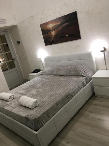 Ένα ή περισσότερα κρεβάτια σε δωμάτιο στο B&B Etnea Palace