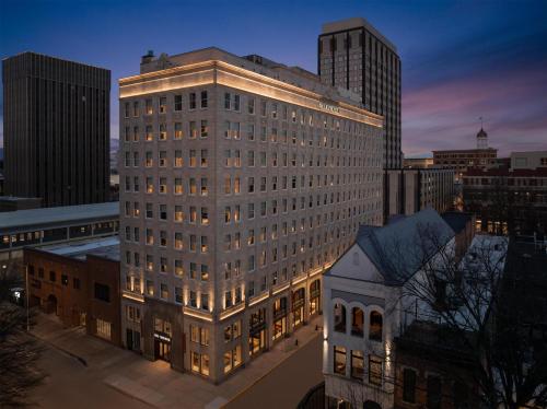 a tall building with lights on in a city at The Waymark Chattanooga, Tapestry Collection By Hilton in Chattanooga