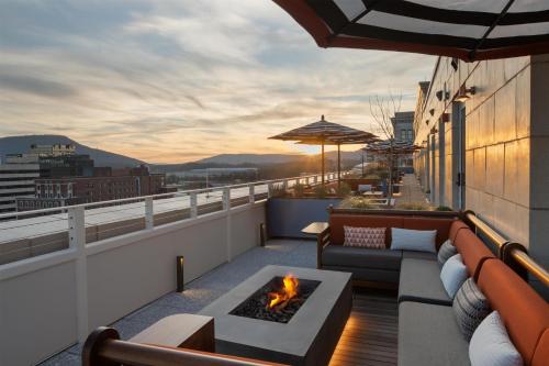 a balcony with a fire pit on a building at The Waymark Chattanooga, Tapestry Collection By Hilton in Chattanooga