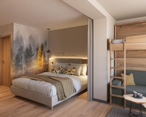 a bedroom with a large bed and a book shelf at Ziach & Candy Grossarl in Grossarl