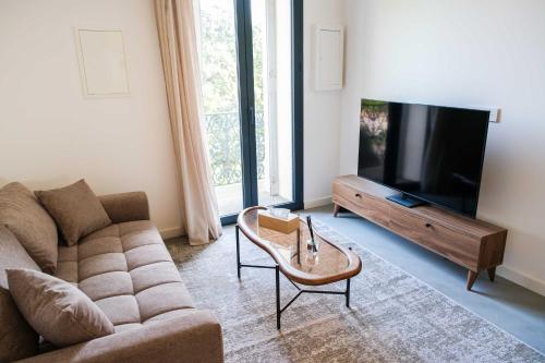 Les Suites du Parc - Séjour élégant face au parc Simone Veil de 2 chambres à 2 minutes des halles