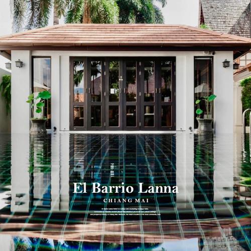a villa in the middle of a pool of water at El Barrio Lanna in Chiang Mai