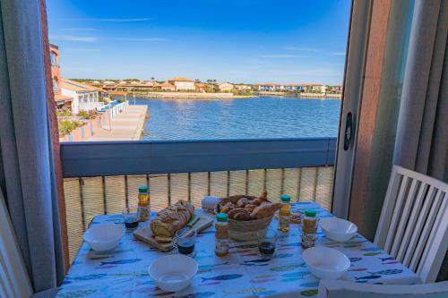 Le Marina Blue Vista - Vue Etang - Place de parking privé - Plage à 5 min - Climatisation - Wifi