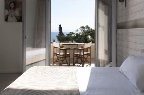 Ένα ή περισσότερα κρεβάτια σε δωμάτιο στο Xanthippi Hotel