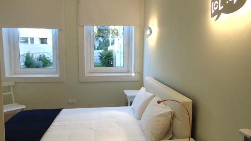 Cama o camas de una habitación en Blue Garden - oporto charming townhouse