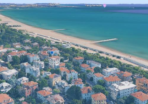 an aerial view of a city and the beach at Villa Gabriella B&B - Apartments in Venice-Lido