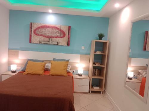 a bedroom with a bed with two lights on at Loft Centrico Bahía 5 in Santander