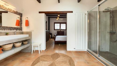 a bathroom with a shower and a sink at Villa Radi by Eivillas in Santa Gertrudis de Fruitera