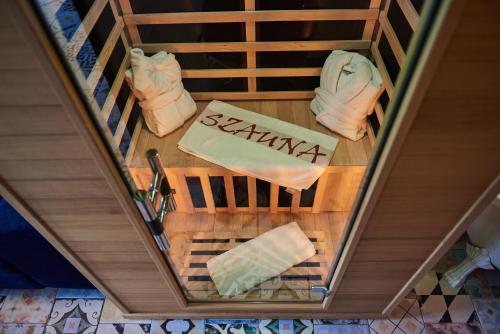 an overhead view of a spiral staircase with towels at Mátra Boutique in Mátraszentimre