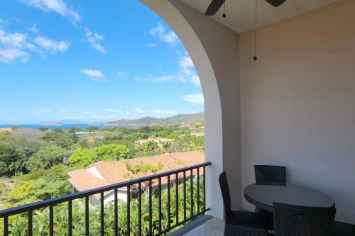 a balcony with a table and a view at Stunning Oceanview Condo with Exceptional Views & Resort-Style Amenities in Coco