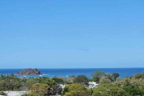 a view of the ocean and an island at Stunning Oceanview Condo with Exceptional Views & Resort-Style Amenities in Coco