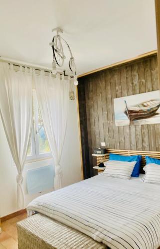 a bedroom with a large bed and a window at Baia dell Alba in Termoli