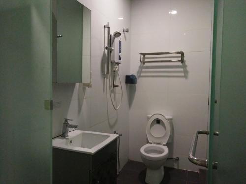 Koupelna v ubytování Amigo Hotel
