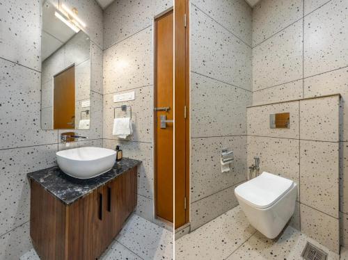 a bathroom with a sink and a toilet at Vaga Valley in Vagamon