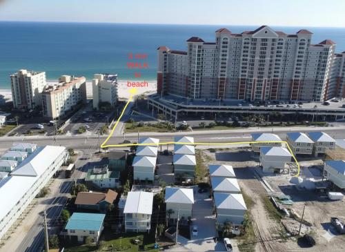 an aerial view of a city with buildings and the ocean at PRIME Coral Dreams Walk to Beach Pool Pets Near The Hangout Parking in Gulf Shores