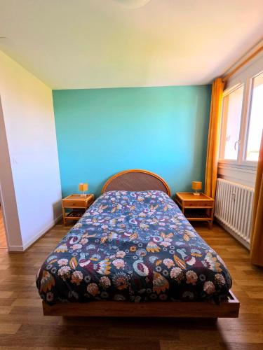 Llit o llits en una habitació de Le Fleuri - Vue Cathédrale & Centre à pied
