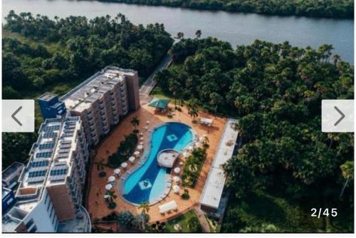 an aerial view of a resort with a swimming pool at Gran Lençóis Flat Barreirinhas Apt 509 in Barreirinhas