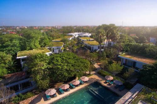 an aerial view of a house with a swimming pool at Hillocks Hotel & Spa in Siem Reap