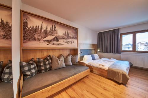 Postel nebo postele na pokoji v ubytování Appartements Der Fuchsbau