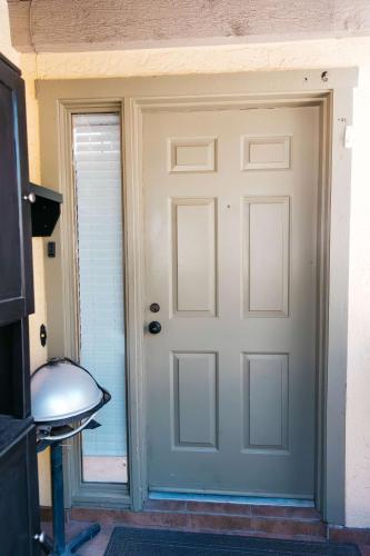 a door leading into a room with a table at Calle Condo in Green Valley