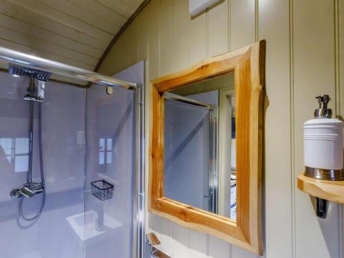 a bathroom with a mirror and a shower at 1 Bed in Lydney oc-85862 in Bream