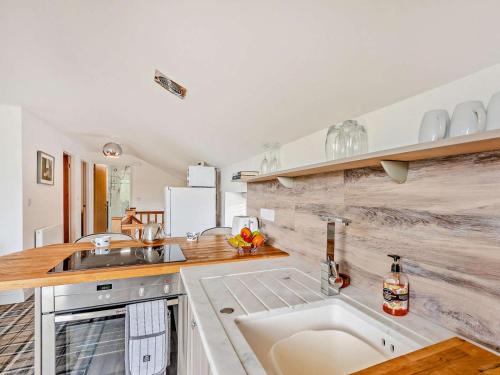 a kitchen with a sink and a counter at 2 Bed in Sheffield oc-92978 in Langsett