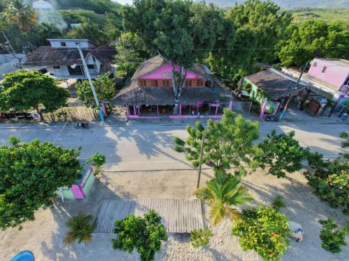 an aerial view of a village with houses and trees at Villa Rosa in Punta Rucia
